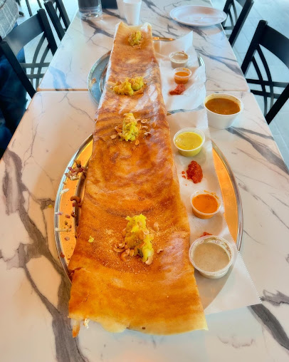 Photo Blockbuster Cafe Bakery Indian Pure Vegetarian - 16