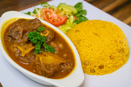 Photo Versace Dominican Restaurant Caribbean Food - 25